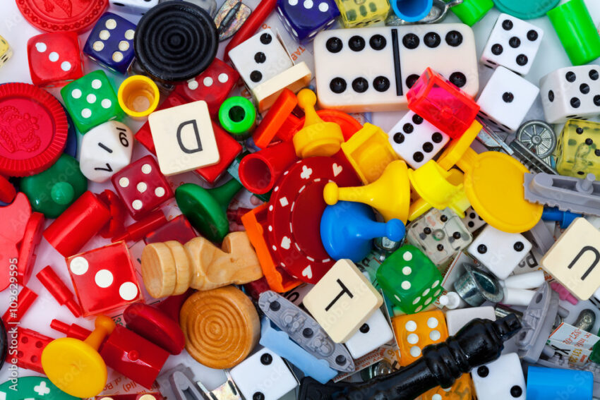 Miscellaneous old board game pieces